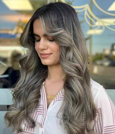 Face-Framing Blended Grey Highlights and Long Layers on Dark Hair
