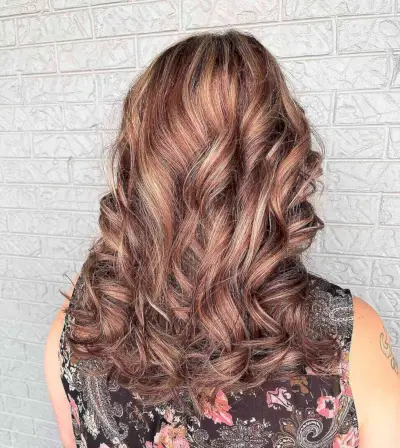 Subtle Strawberry Pink Highlights on Rose Gold Hair