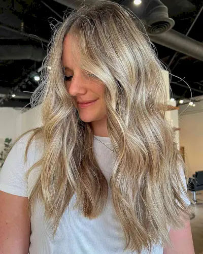 Glossy Warm Blonde Babylights Balayage with Shadow Root for Mid-Long Hair