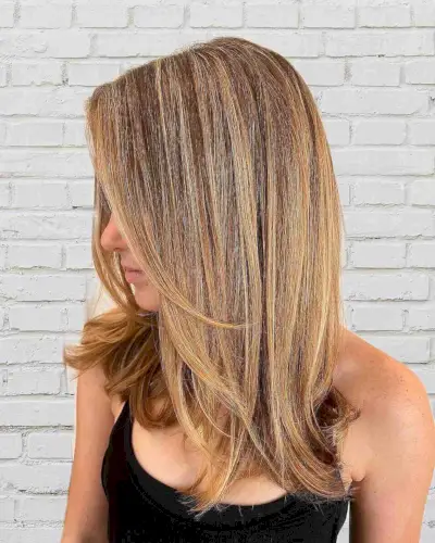 Dimensional Honey Blonde Color on Straight Layered Hair