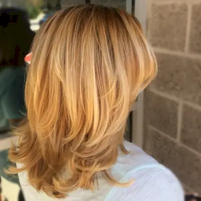 Warm & neutral honey blonde hair color