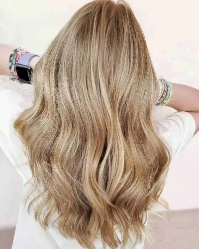 Natural-Looking Honey Blonde hair color idea