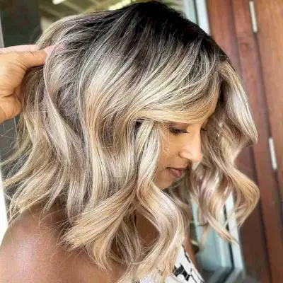 Honey Blonde with a Shadow Root on Medium-Length Hair