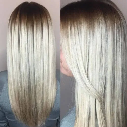 Bemerkenswerte Platin-Highlights auf braunem Haar' title=