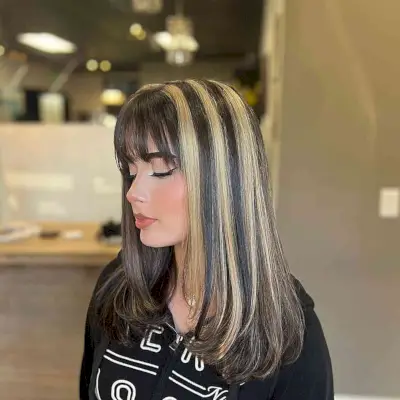 Medium Hair with Dark Base and Warm Blonde Skunk Stripes