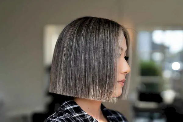 Sleek Chin-Length Bob with Full Highlights
