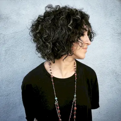 Dark Curly Hair with Silver Blonde Highlights