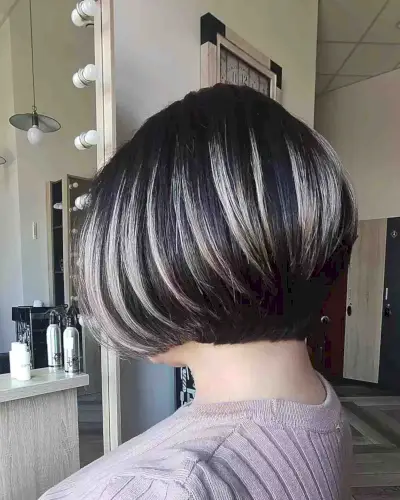 Undercut Black Bob with Chunky Blonde Highlighted Streaks