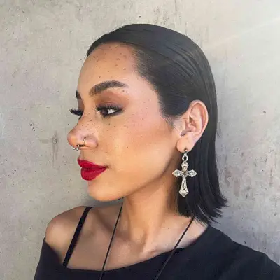 Short Black Slick Back Wet Hairstyle