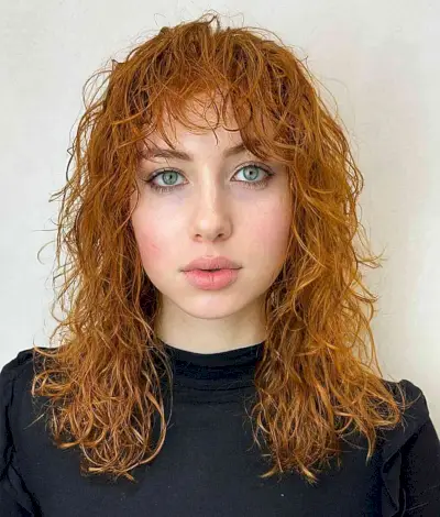 Wet Curly Wolf Cut Hairstyle