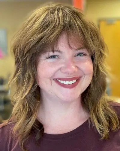 Textured Shaggy Cut for a Soft Jawline