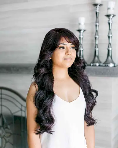 Longer Dark Mermaid Hair with Side-Swept Bangs