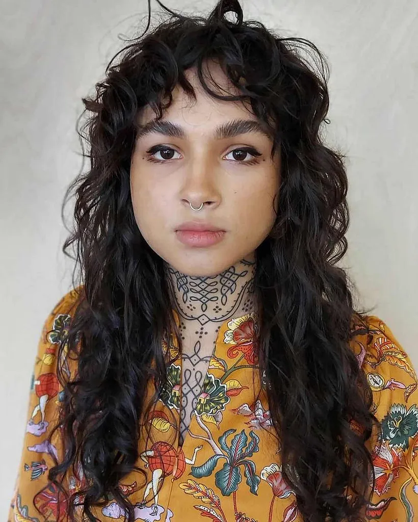 cortes de navaja para cabello rizado' title=