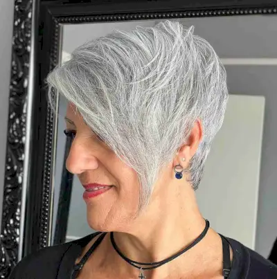 Grey Pixie Hair with Long Side Bangs for a Long Face Shape