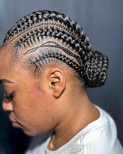 Volleyball Inspired Cornrow Braids with Low Bun for Black Women