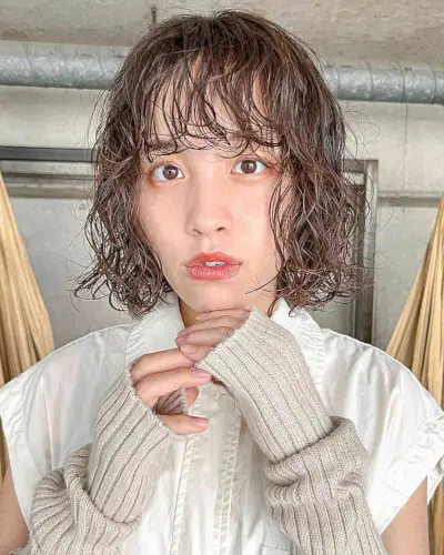 Textured Chin Bob with Perm Body Waves