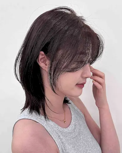 Medium-Length Hush Cut with Bangs