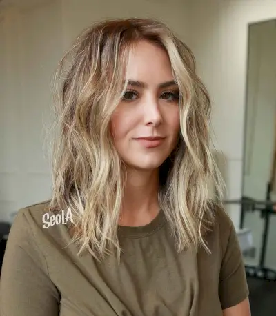 textured shoulder-length shag for a heart face