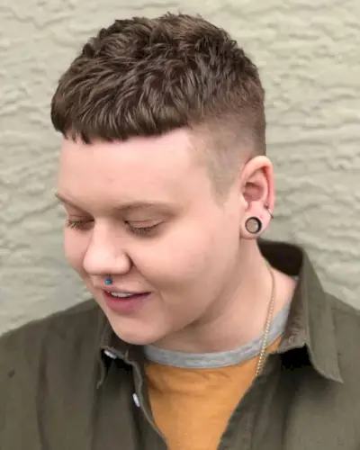 Cute Androgynous Bowl Cut with Shaved Sides for Round Faces