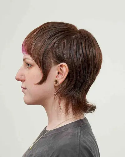 Sleek Androgynous Mullet with Full Bangs
