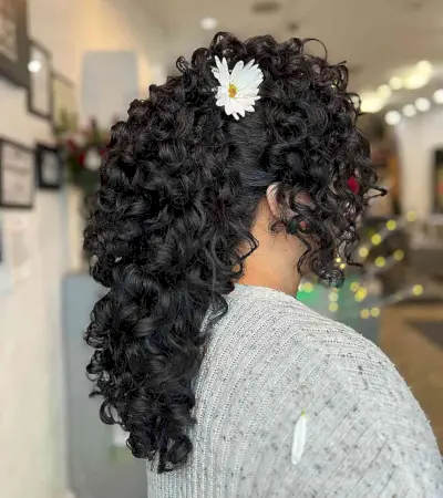 Side-Swept Hairstyle with Flower