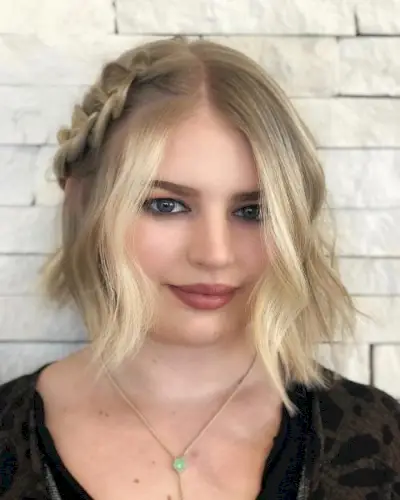 Picture of a middle part side braid that compliments short hair