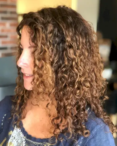 spiral side swept perm on medium hair