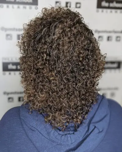 soft spiral perm on medium length hair