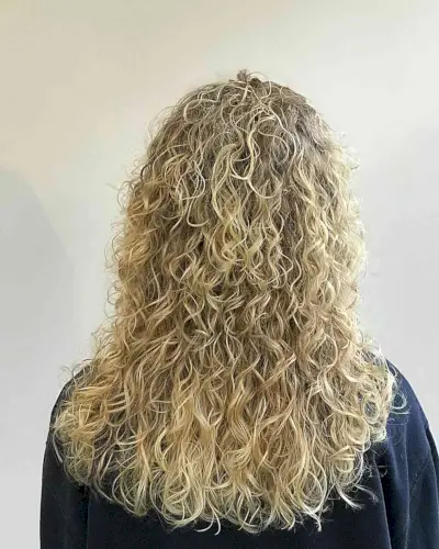 Mid-Long Spiral Permed Hair with Layers