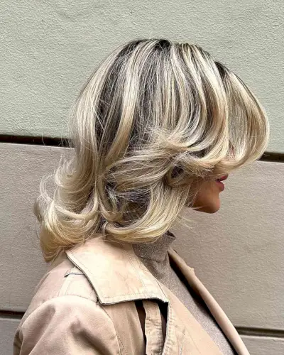 Shoulder-Length Feathered Butterfly Cut with Front Layers for Bright Blonde with Dark Roots