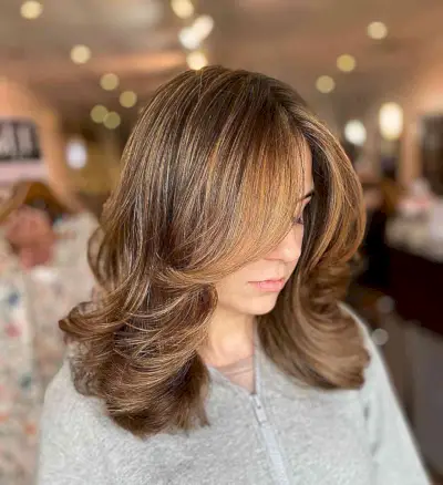 Medium-Length Layered Butterfly Cut with Face Frame for Golden Bronde Hair