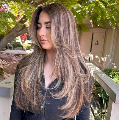 Dimensional Bronde Butterfly Hair with Long Layers for Rounder Face Shapes