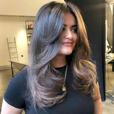 Mid-Length Middle Part Hair with Butterfly Cut