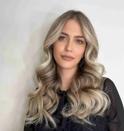 Soft Ash Blonde Medium-Length Cut with a Middle Part