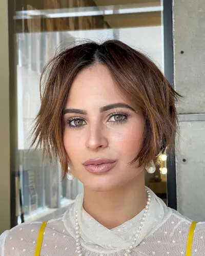very short bob with a center part