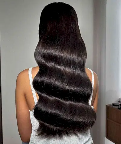 Sleek Hollywood Waves on Long Dark Hair