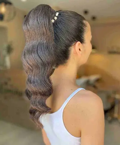 High Ponytail with Sleek Hollywood Waves
