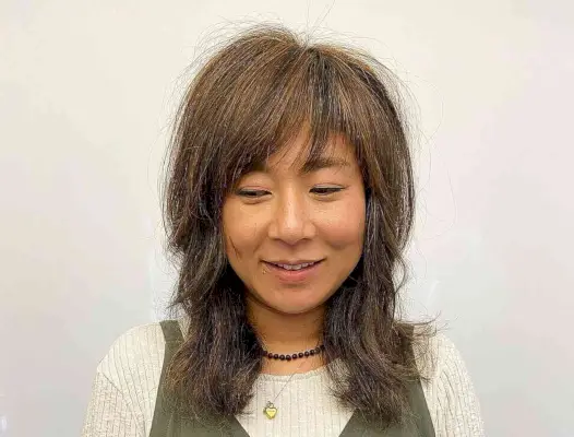 Wash-and-Wear Shaggy Layers with Wispy Bangs