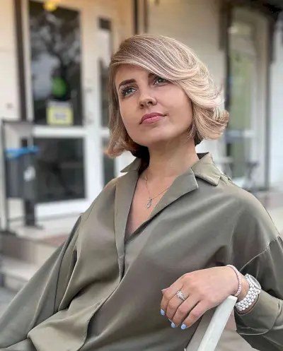 Vintage-Inspired Deeply Side-Parted Hairstyle for ladies with short hair