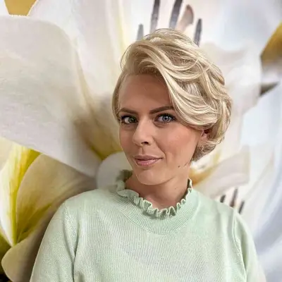 Heavily Layered Short Hair with a Deep Side Part