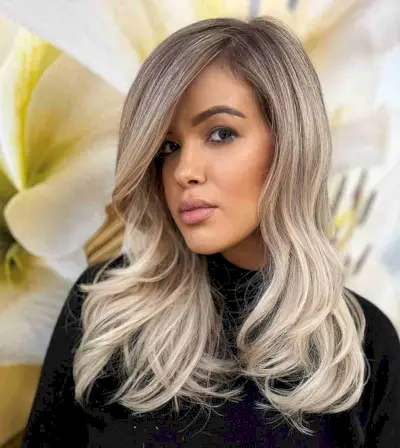 Deep Side-Parted Medium to Long Hairstyle