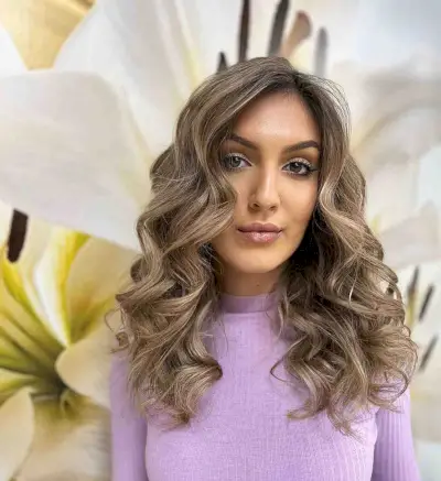 Ash Brown Balayage with a Deep Off-Center Side Part
