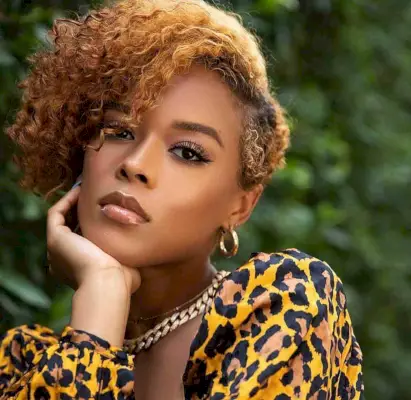 Blonde Asymmetric Pixie with a Deep Side Part