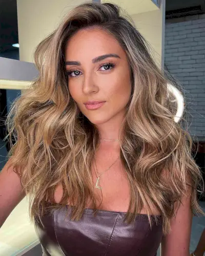 Deep Side Part and Tousled Loose Waves