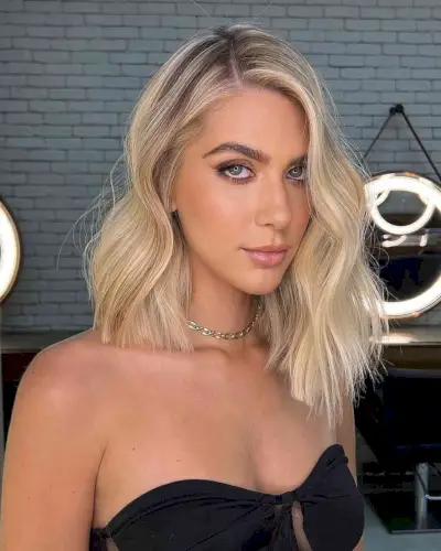 Deeply Side-Parted Asymmetrical Medium Cut on Thin Hair