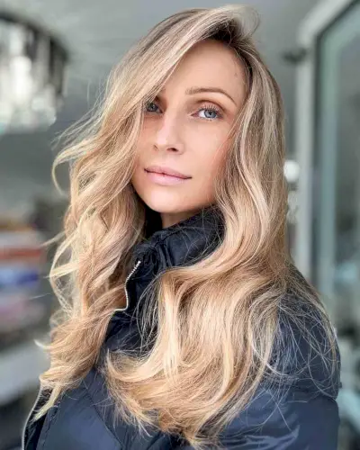 Side-Swept Wavy Long Hair with a Deep Side Part