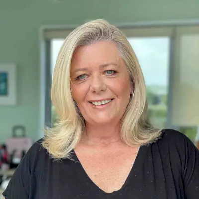 Deep Side Part and Flipped Ends for Women Over 60