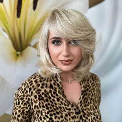 Deep Side Part and a Swooping Fringe