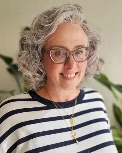 Side-Parted Bob with Curls for Women with Big Foreheads and glasses