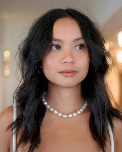 Modern Shag with a Middle Part for Big Foreheads 